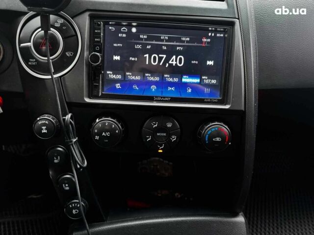 Сірий Cанг Йонг KYRON DELUXE, об'ємом двигуна 2 л та пробігом 220 тис. км за 8390 $, фото 18 на Automoto.ua