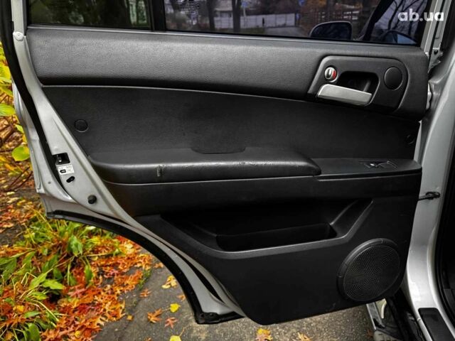 Сірий Cанг Йонг KYRON DELUXE, об'ємом двигуна 2 л та пробігом 220 тис. км за 8390 $, фото 20 на Automoto.ua