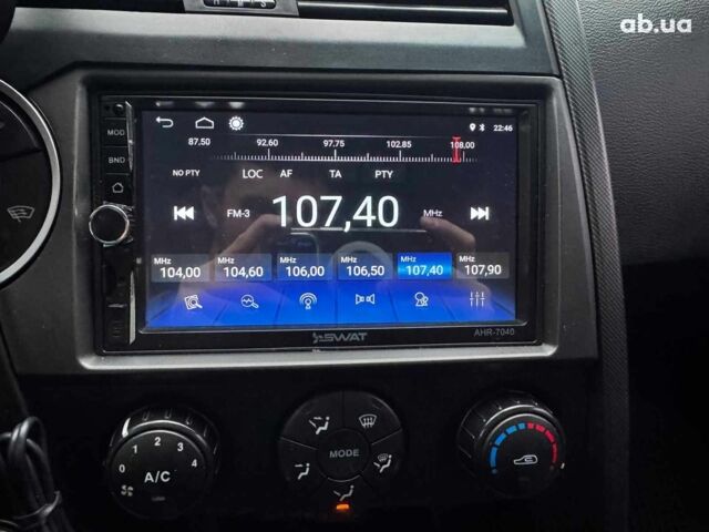 Сірий Cанг Йонг KYRON DELUXE, об'ємом двигуна 2 л та пробігом 220 тис. км за 8390 $, фото 17 на Automoto.ua