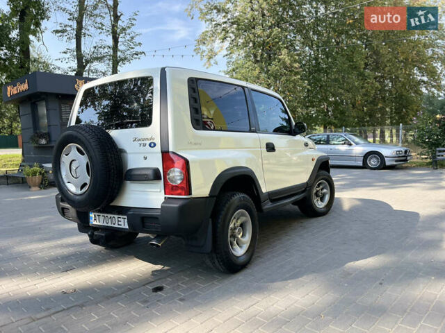 Белый Cанг Йонг Корандо, объемом двигателя 2.3 л и пробегом 268 тыс. км за 7399 $, фото 4 на Automoto.ua