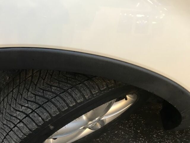 Белый Cанг Йонг Корандо, объемом двигателя 2 л и пробегом 118 тыс. км за 7500 $, фото 12 на Automoto.ua