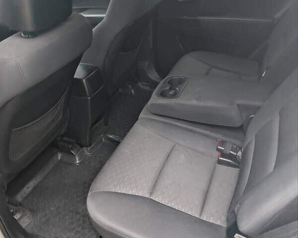 Белый Cанг Йонг Корандо, объемом двигателя 2 л и пробегом 192 тыс. км за 5900 $, фото 12 на Automoto.ua