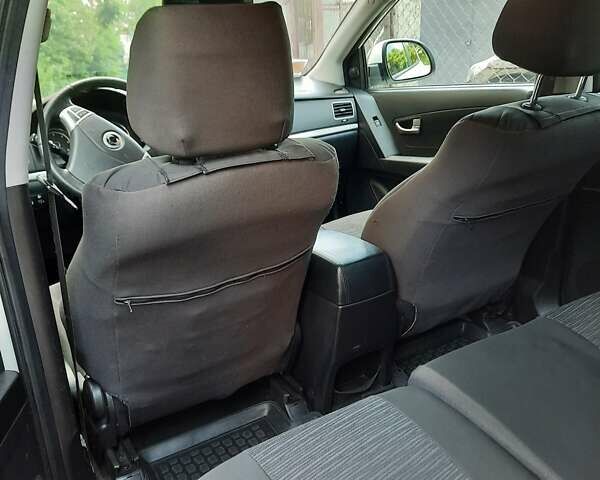 Білий Cанг Йонг Korando, об'ємом двигуна 2 л та пробігом 148 тис. км за 9500 $, фото 4 на Automoto.ua
