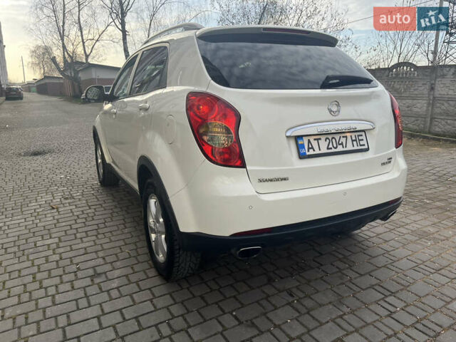 Белый Cанг Йонг Корандо, объемом двигателя 2 л и пробегом 220 тыс. км за 8400 $, фото 8 на Automoto.ua