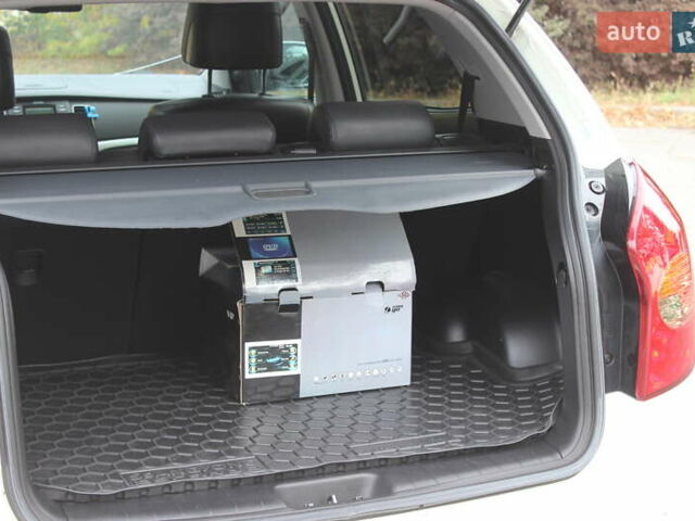 Белый Cанг Йонг Корандо, объемом двигателя 2 л и пробегом 62 тыс. км за 11400 $, фото 34 на Automoto.ua