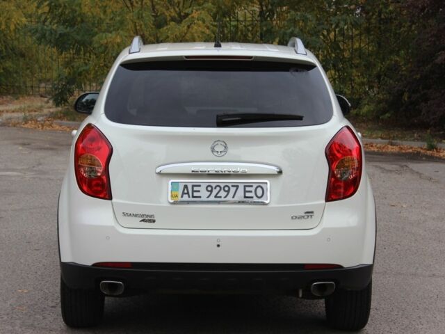 Белый Cанг Йонг Корандо, объемом двигателя 2 л и пробегом 62 тыс. км за 11300 $, фото 3 на Automoto.ua