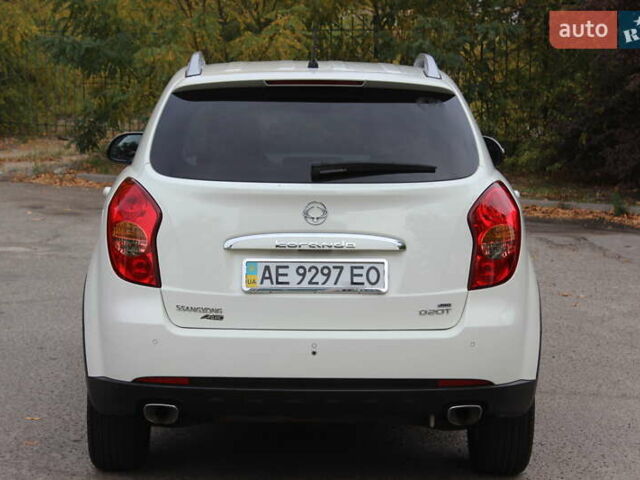 Білий Cанг Йонг Korando, об'ємом двигуна 2 л та пробігом 62 тис. км за 11700 $, фото 6 на Automoto.ua