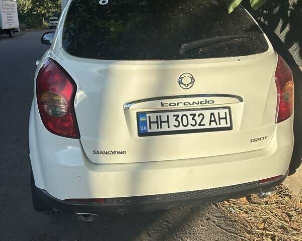 Білий Cанг Йонг Korando, об'ємом двигуна 2 л та пробігом 130 тис. км за 7800 $, фото 11 на Automoto.ua