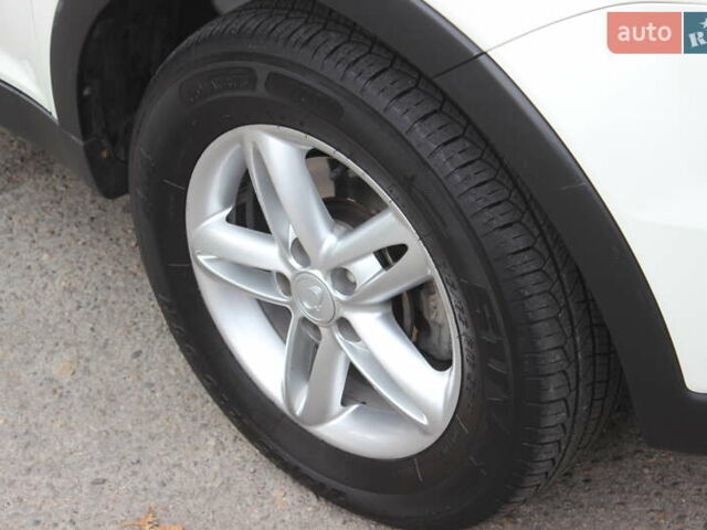 Білий Cанг Йонг Korando, об'ємом двигуна 2 л та пробігом 62 тис. км за 11700 $, фото 12 на Automoto.ua