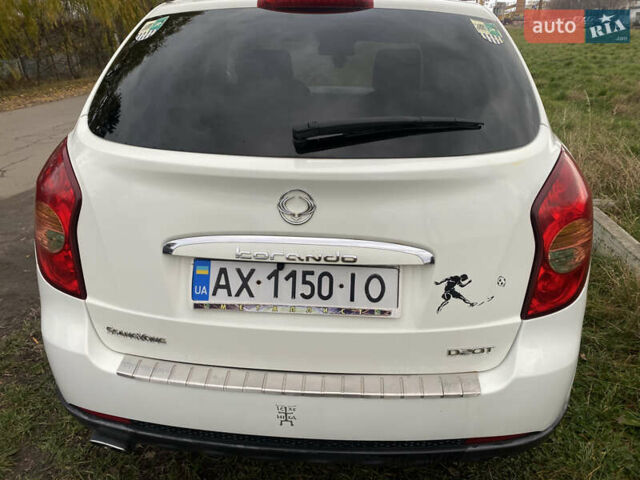 Белый Cанг Йонг Корандо, объемом двигателя 2 л и пробегом 240 тыс. км за 8000 $, фото 10 на Automoto.ua