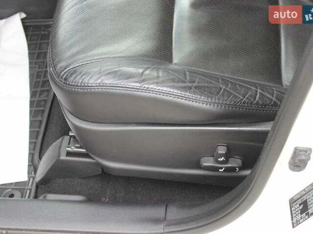 Білий Cанг Йонг Korando, об'ємом двигуна 2 л та пробігом 62 тис. км за 11700 $, фото 16 на Automoto.ua