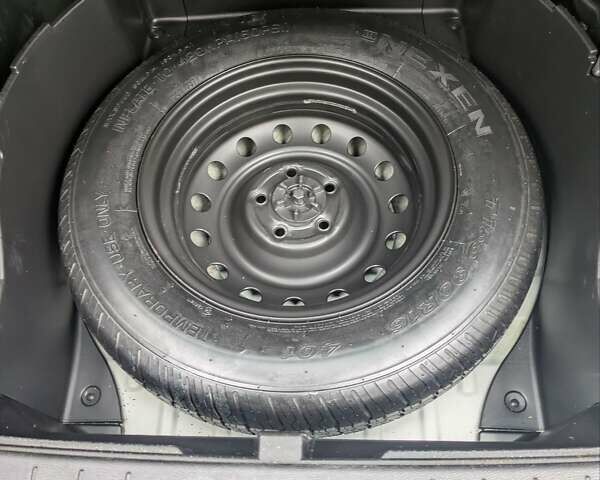 Белый Cанг Йонг Корандо, объемом двигателя 2 л и пробегом 192 тыс. км за 5900 $, фото 11 на Automoto.ua