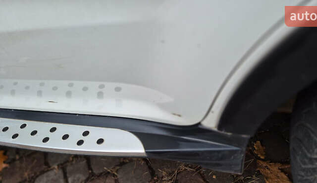 Белый Cанг Йонг Корандо, объемом двигателя 2 л и пробегом 104 тыс. км за 9900 $, фото 14 на Automoto.ua