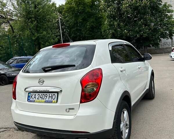 Білий Cанг Йонг Korando, об'ємом двигуна 2 л та пробігом 158 тис. км за 8600 $, фото 10 на Automoto.ua