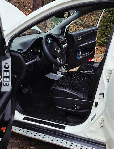 Белый Cанг Йонг Корандо, объемом двигателя 2 л и пробегом 104 тыс. км за 9900 $, фото 9 на Automoto.ua