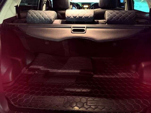 Белый Cанг Йонг Корандо, объемом двигателя 2 л и пробегом 98 тыс. км за 10500 $, фото 9 на Automoto.ua