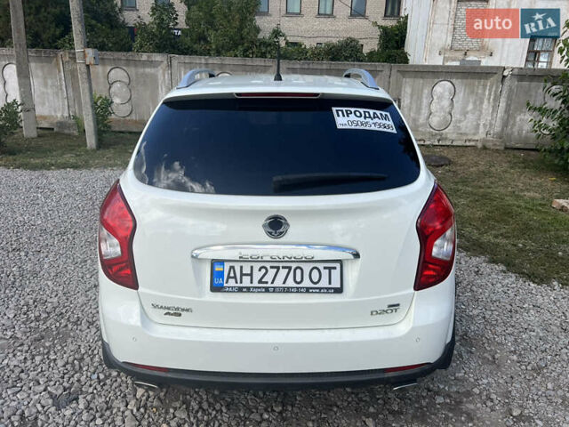 Білий Cанг Йонг Korando, об'ємом двигуна 2 л та пробігом 150 тис. км за 10500 $, фото 4 на Automoto.ua