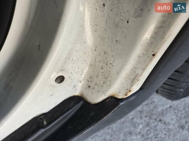 Бежевий Cанг Йонг Korando, об'ємом двигуна 2 л та пробігом 297 тис. км за 7000 $, фото 11 на Automoto.ua