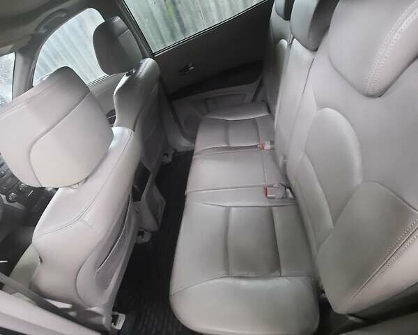 Бежевий Cанг Йонг Korando, об'ємом двигуна 2 л та пробігом 150 тис. км за 9200 $, фото 7 на Automoto.ua