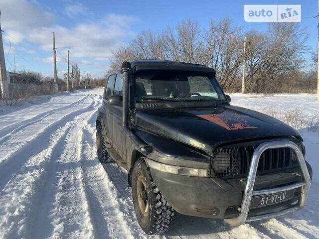 Чорний Cанг Йонг Korando, об'ємом двигуна 2.9 л та пробігом 250 тис. км за 2800 $, фото 2 на Automoto.ua