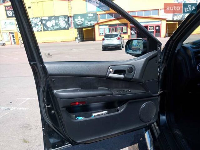 Чорний Cанг Йонг Korando, об'ємом двигуна 2 л та пробігом 263 тис. км за 7500 $, фото 19 на Automoto.ua