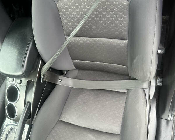 Чорний Cанг Йонг Korando, об'ємом двигуна 2 л та пробігом 138 тис. км за 6900 $, фото 10 на Automoto.ua