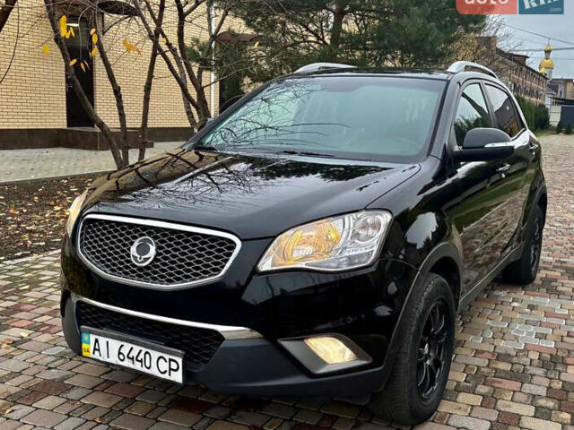 Черный Cанг Йонг Корандо, объемом двигателя 2 л и пробегом 168 тыс. км за 7200 $, фото 8 на Automoto.ua