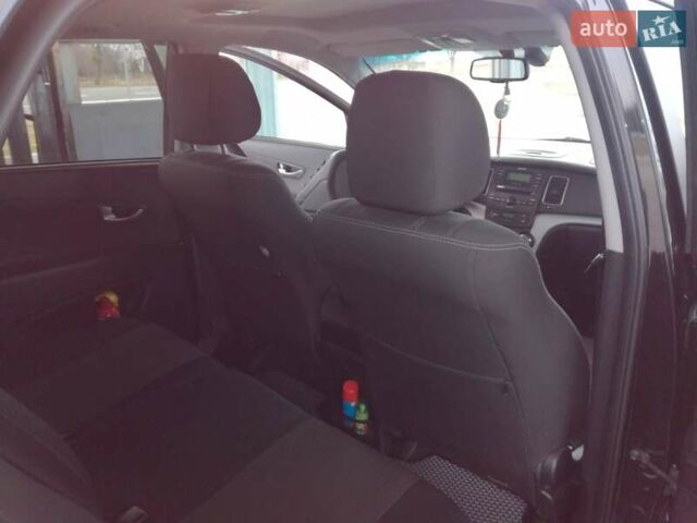 Чорний Cанг Йонг Korando, об'ємом двигуна 2 л та пробігом 114 тис. км за 8900 $, фото 9 на Automoto.ua