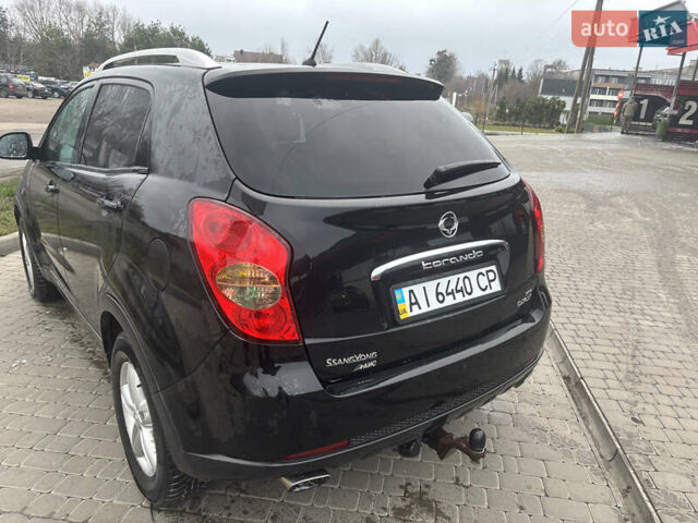 Черный Cанг Йонг Корандо, объемом двигателя 2 л и пробегом 168 тыс. км за 7900 $, фото 11 на Automoto.ua