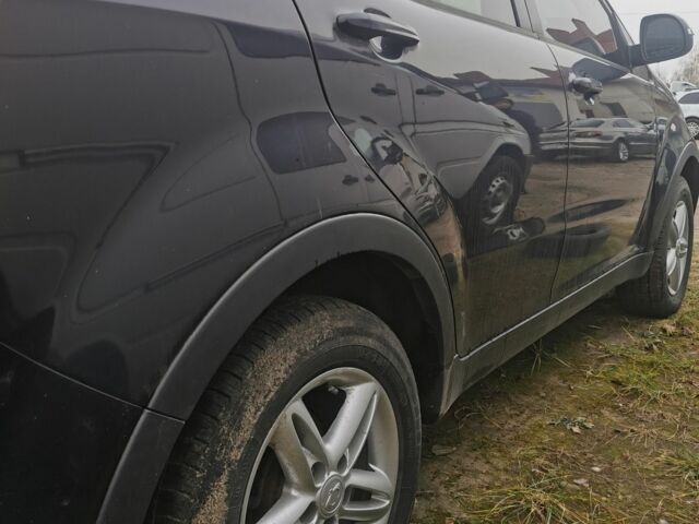 Черный Cанг Йонг Корандо, объемом двигателя 2 л и пробегом 350 тыс. км за 7000 $, фото 15 на Automoto.ua