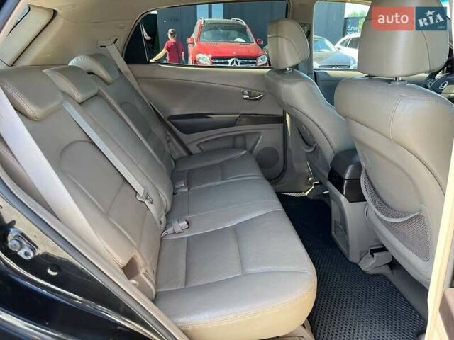 Чорний Cанг Йонг Korando, об'ємом двигуна 2 л та пробігом 208 тис. км за 7400 $, фото 31 на Automoto.ua