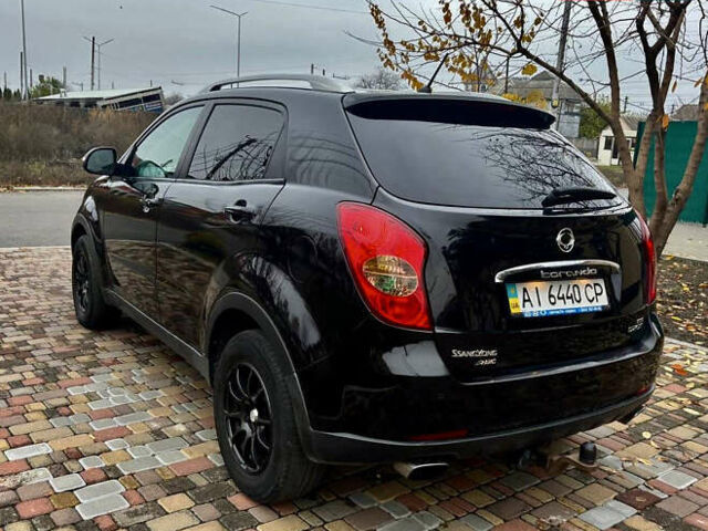 Черный Cанг Йонг Корандо, объемом двигателя 2 л и пробегом 168 тыс. км за 7200 $, фото 18 на Automoto.ua