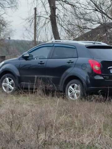 Чорний Cанг Йонг Korando, об'ємом двигуна 2 л та пробігом 218 тис. км за 7499 $, фото 1 на Automoto.ua