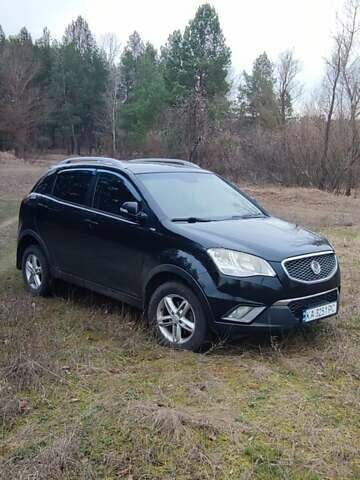 Чорний Cанг Йонг Korando, об'ємом двигуна 2 л та пробігом 216 тис. км за 7995 $, фото 8 на Automoto.ua