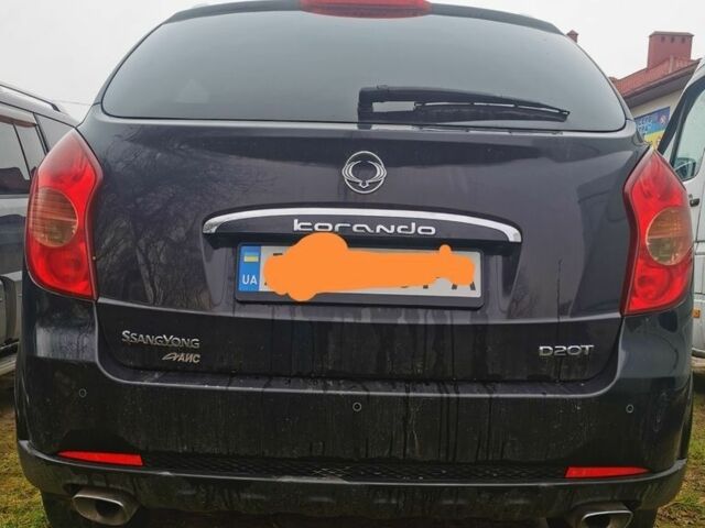 Черный Cанг Йонг Корандо, объемом двигателя 2 л и пробегом 350 тыс. км за 7000 $, фото 3 на Automoto.ua