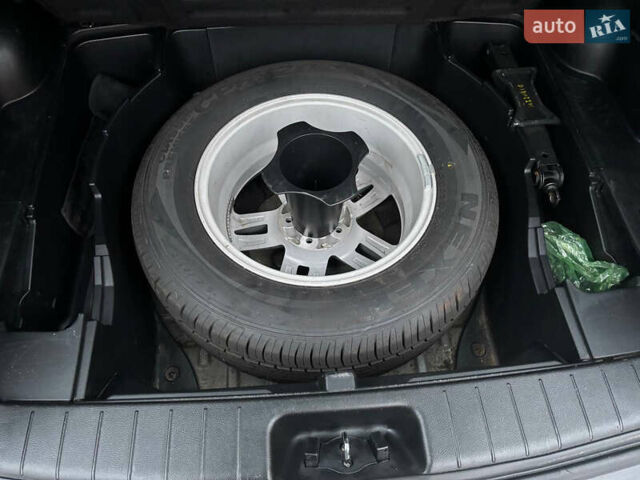 Черный Cанг Йонг Корандо, объемом двигателя 2 л и пробегом 168 тыс. км за 7200 $, фото 32 на Automoto.ua