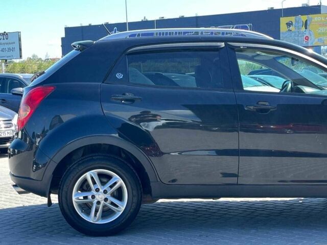 Чорний Cанг Йонг Korando, об'ємом двигуна 2 л та пробігом 208 тис. км за 6990 $, фото 12 на Automoto.ua