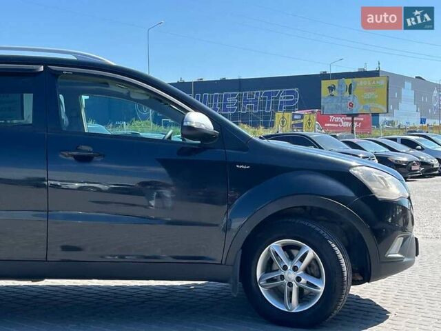 Чорний Cанг Йонг Korando, об'ємом двигуна 2 л та пробігом 208 тис. км за 7400 $, фото 11 на Automoto.ua