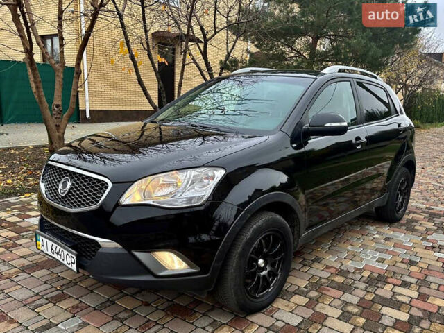 Черный Cанг Йонг Корандо, объемом двигателя 2 л и пробегом 168 тыс. км за 7200 $, фото 15 на Automoto.ua