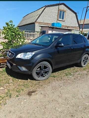 Черный Cанг Йонг Корандо, объемом двигателя 2 л и пробегом 194 тыс. км за 6000 $, фото 12 на Automoto.ua