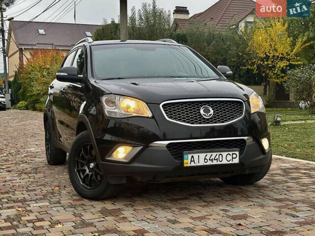 Черный Cанг Йонг Корандо, объемом двигателя 2 л и пробегом 168 тыс. км за 7200 $, фото 48 на Automoto.ua