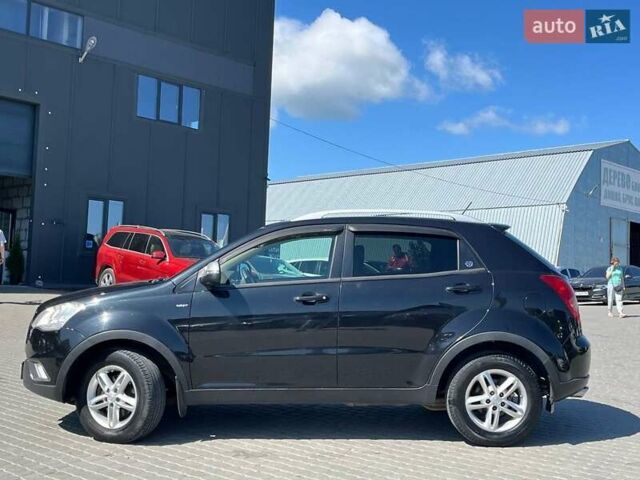 Чорний Cанг Йонг Korando, об'ємом двигуна 2 л та пробігом 208 тис. км за 7400 $, фото 8 на Automoto.ua