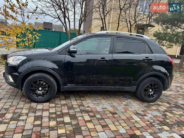 Черный Cанг Йонг Корандо, объемом двигателя 2 л и пробегом 168 тыс. км за 7200 $, фото 16 на Automoto.ua