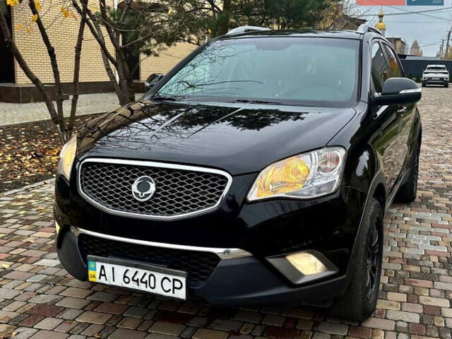 Черный Cанг Йонг Корандо, объемом двигателя 2 л и пробегом 168 тыс. км за 7200 $, фото 7 на Automoto.ua