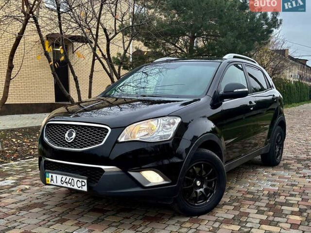 Черный Cанг Йонг Корандо, объемом двигателя 2 л и пробегом 168 тыс. км за 7200 $, фото 11 на Automoto.ua