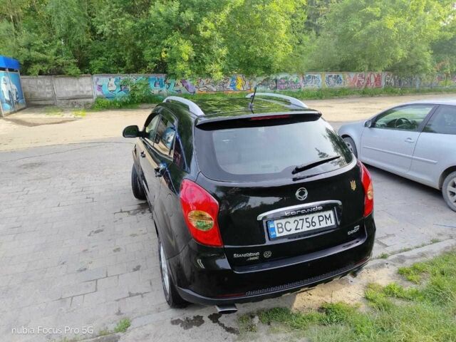 Чорний Cанг Йонг Korando, об'ємом двигуна 2 л та пробігом 144 тис. км за 8300 $, фото 2 на Automoto.ua