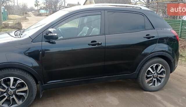Черный Cанг Йонг Корандо, объемом двигателя 2 л и пробегом 220 тыс. км за 8500 $, фото 3 на Automoto.ua