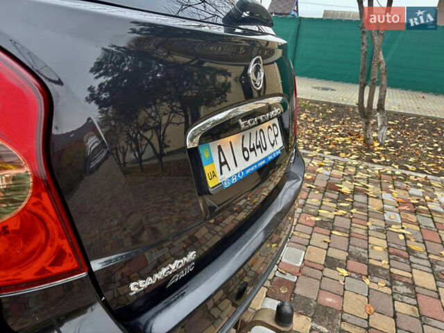 Черный Cанг Йонг Корандо, объемом двигателя 2 л и пробегом 168 тыс. км за 7200 $, фото 23 на Automoto.ua