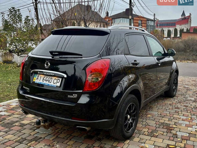 Черный Cанг Йонг Корандо, объемом двигателя 2 л и пробегом 168 тыс. км за 7200 $, фото 35 на Automoto.ua