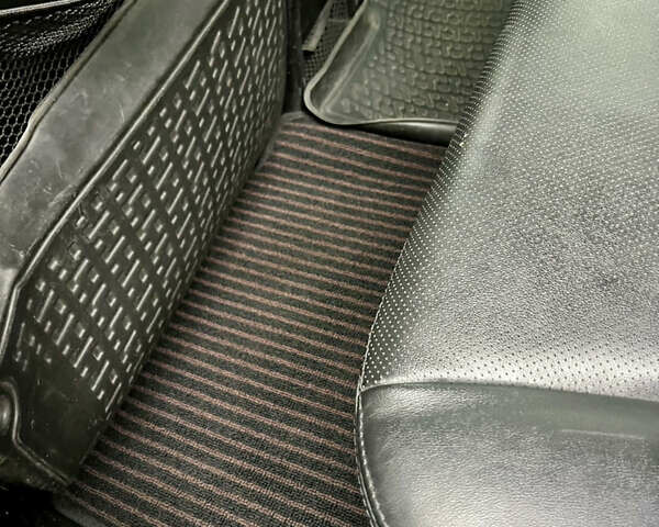 Черный Cанг Йонг Корандо, объемом двигателя 2 л и пробегом 168 тыс. км за 7200 $, фото 84 на Automoto.ua